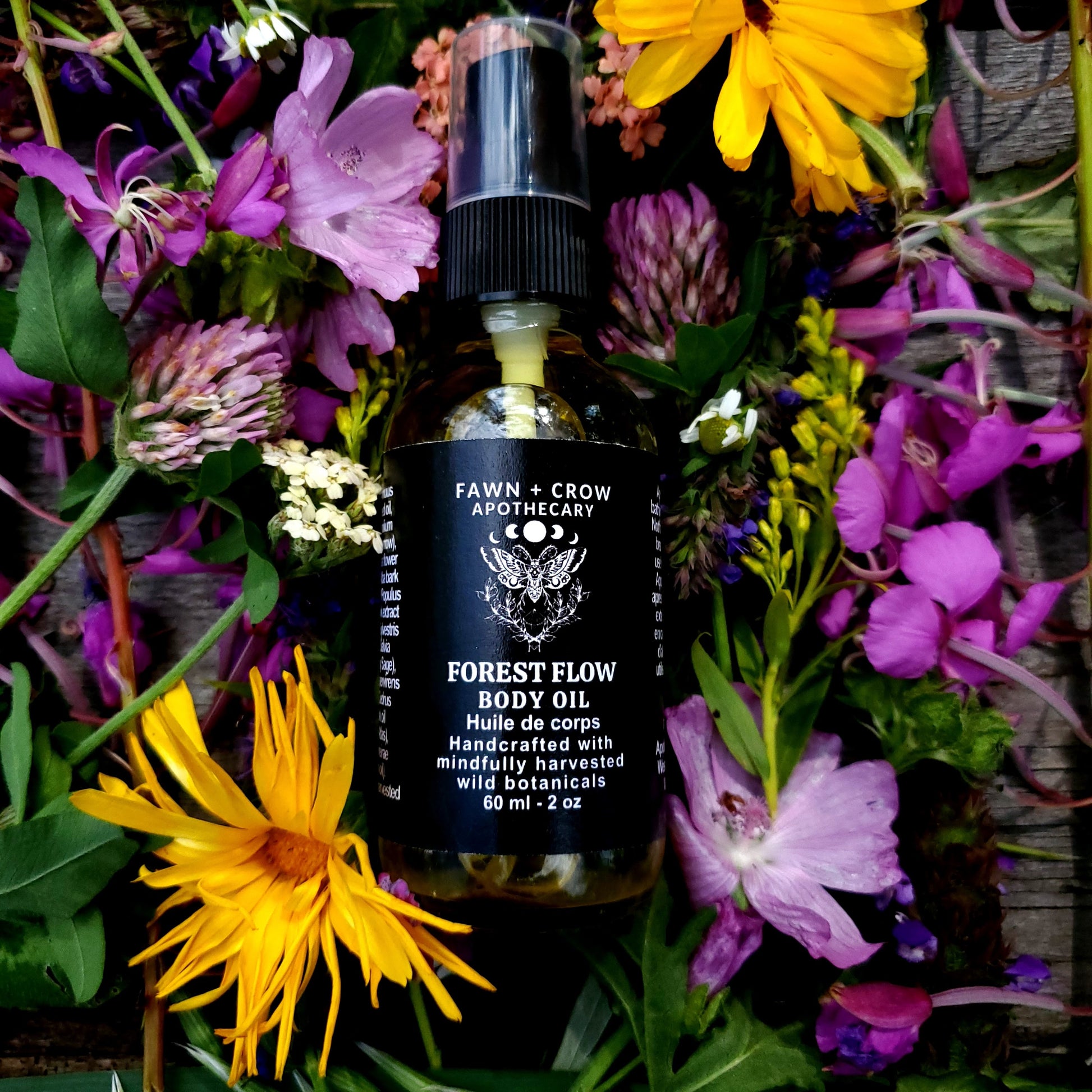 A bottle of Fawn and Crow Apothecary herbal body oil